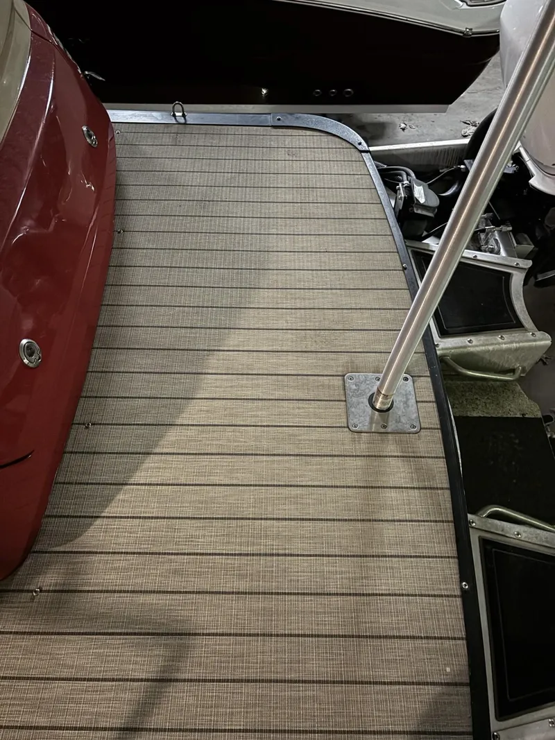 Slide: The Image of 2022 Avalon Excalibur Elite Windshield boat deck with sleek design and sturdy construction. - 24