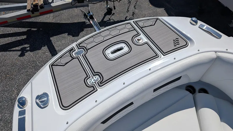 Slide: The Image of 2025 Four Winns HD8 OB boat deck with sleek design and modern features. - 23