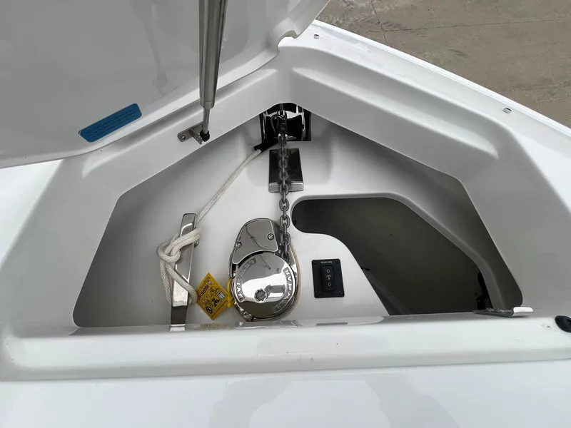 Slide: The Image of Anchor compartment of 2023 Cobalt A29 boat with rope and winch system. - 10