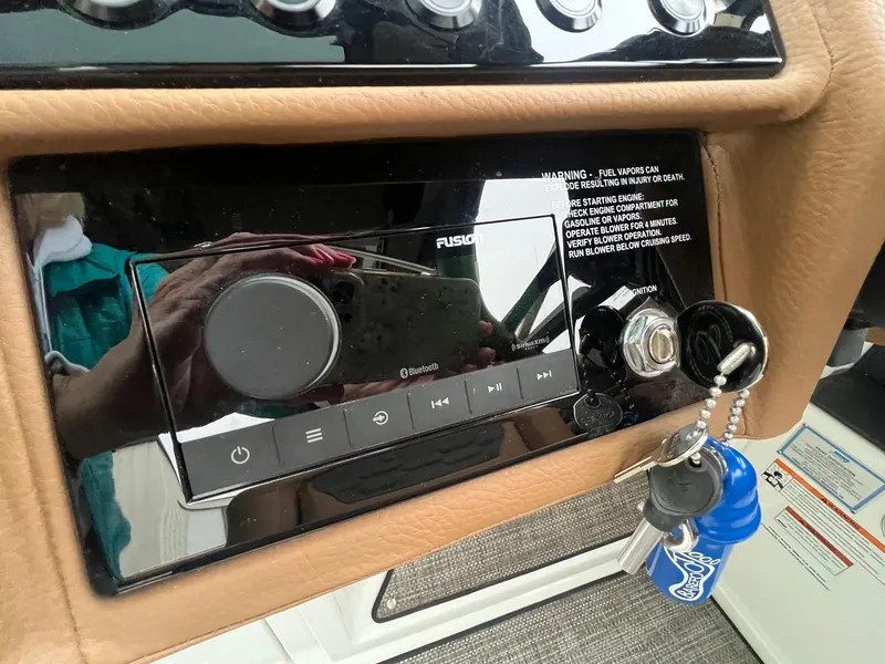 Slide: The Image of 2023 Cobalt A29 dashboard with Fusion audio system and ignition keys. - 17