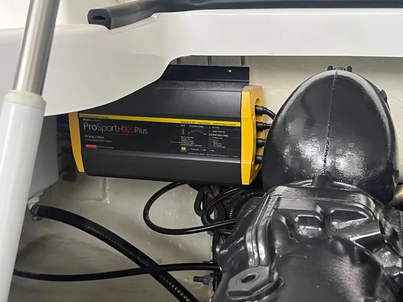 Slide: The Image of 2023 Cobalt A29 engine compartment with ProSport HD20Plus marine battery charger. - 31