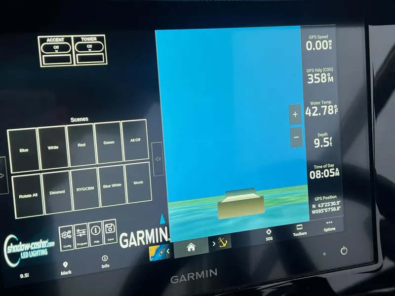 Slide: The Image of Garmin display on 2023 Cobalt A29 showing GPS data and LED lighting controls. - 34