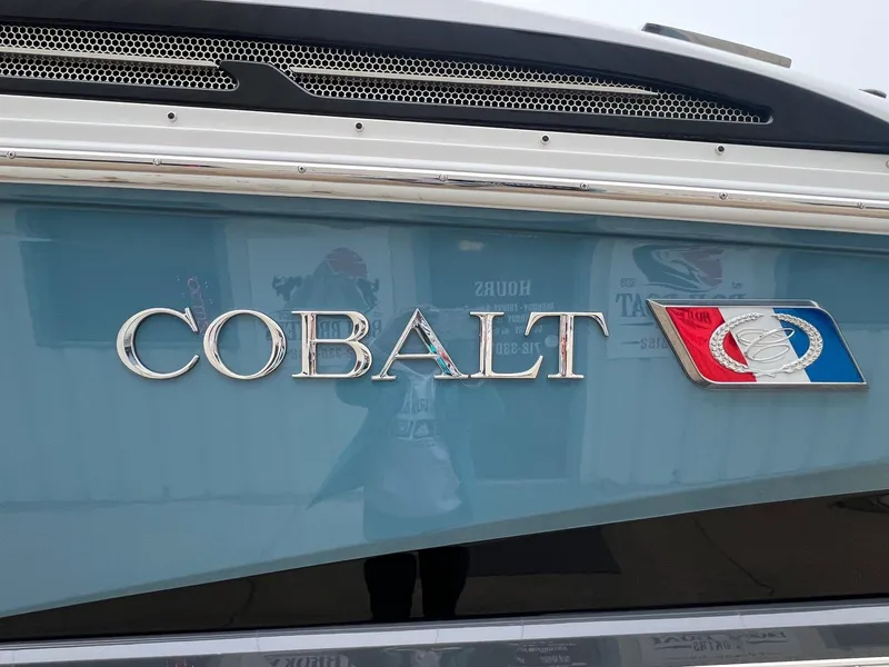 Slide: The Image of 2023 Cobalt A29 boat logo on a sleek blue surface. - 5