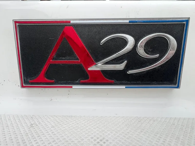 Slide: The Image of 2023 Cobalt A29 logo with red and silver lettering on a black background. - 6