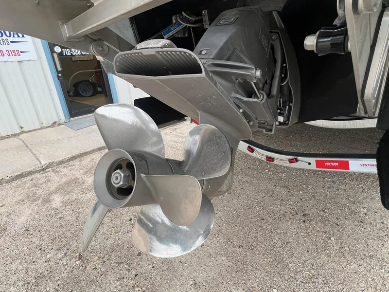 Slide: The Image of Close-up of a 2023 Cobalt A29 boat propeller and outdrive on a trailer. - 7