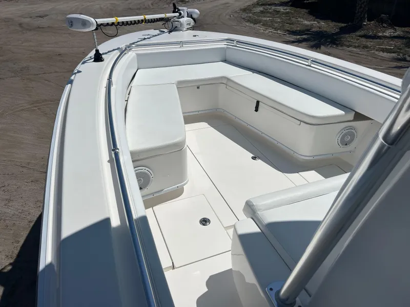 Slide: The Image of 2013 Contender 28 Sport boat with spacious seating and clean deck design. - 12