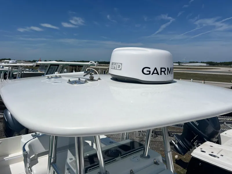 Slide: The Image of 2013 Contender 28 Sport boat with Garmin radar on top. - 20