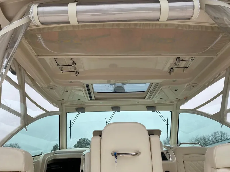 Slide: The Image of Interior view of 2017 Grady-White Express 370 boat with sunroof and seating. - 14
