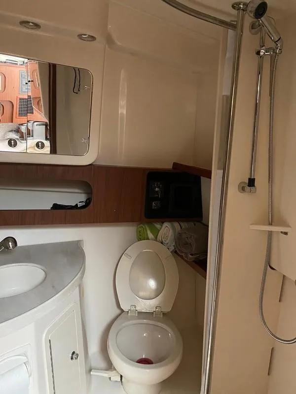 Slide: The Image of Bathroom interior of 2017 Grady-White Express 370 boat with shower and toilet. - 19