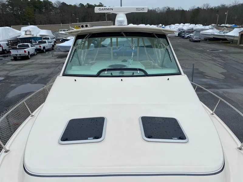 Slide: The Image of 2017 Grady-White Express 370 boat with Garmin radar, docked in a marina. - 25
