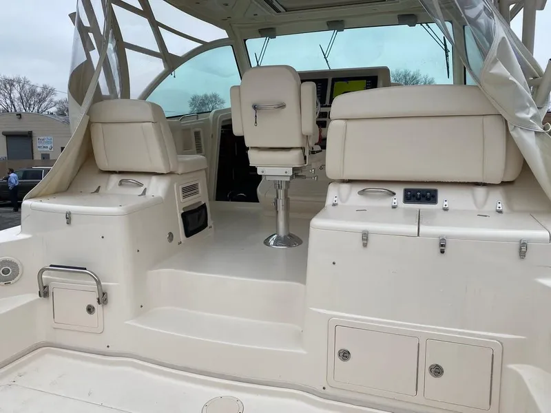 Slide: The Image of 2017 Grady-White Express 370 boat interior with seating and helm station. - 3