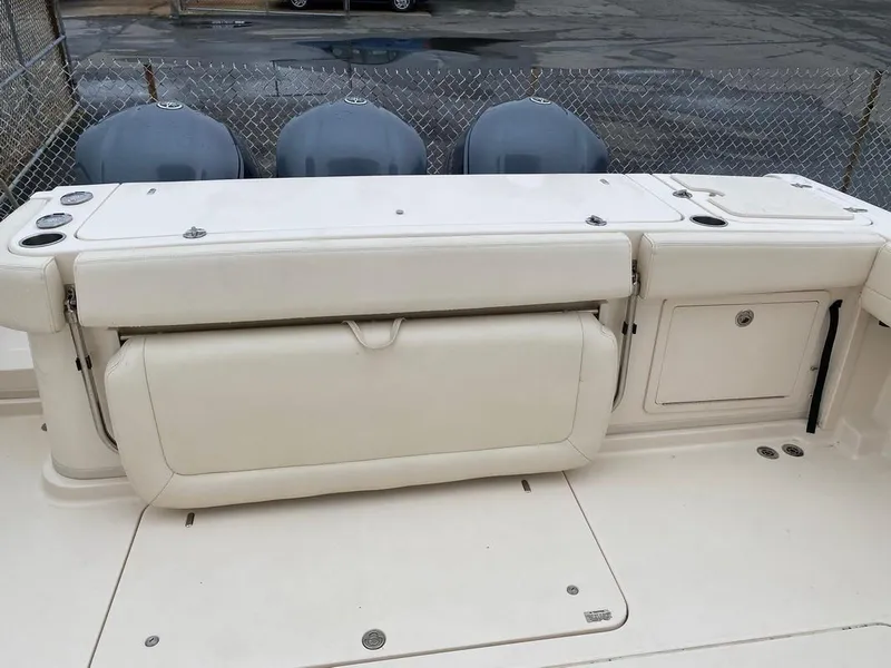 Slide: The Image of 2017 Grady-White Express 370 boat deck with storage compartments and seating. - 8