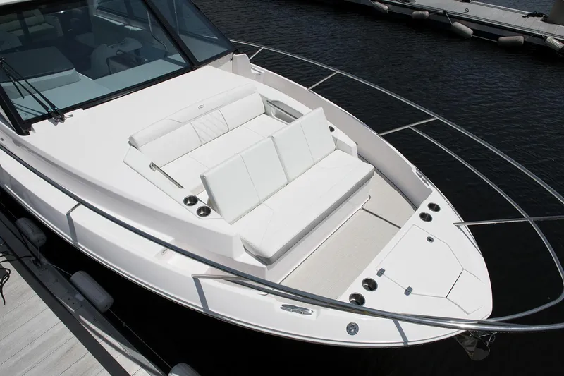 Slide: The Image of Modern kitchen area on a 2026 Regal 36 XO yacht with sink and induction cooktop. - 10