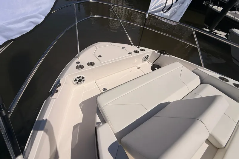 Slide: The Image of 2026 Regal 36 XO boat with sleek seating and stainless steel railings. - 54