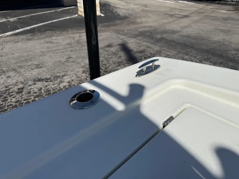 Slide: The Image of 2025 Pathfinder 2300 HPS boat deck detail with cleat and rod holder. - 39