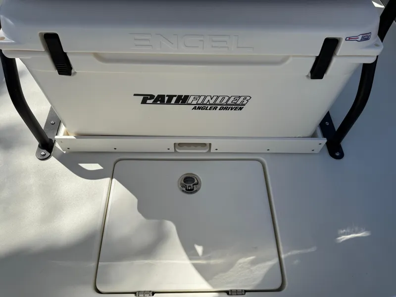 Slide: The Image of 2025 Pathfinder 2300 HPS boat with Engel cooler and storage compartment. - 42