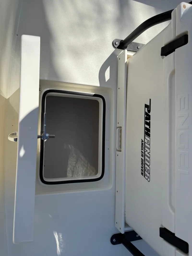 Slide: The Image of 2025 Pathfinder 2300 HPS boat storage compartment with Engel cooler. - 44