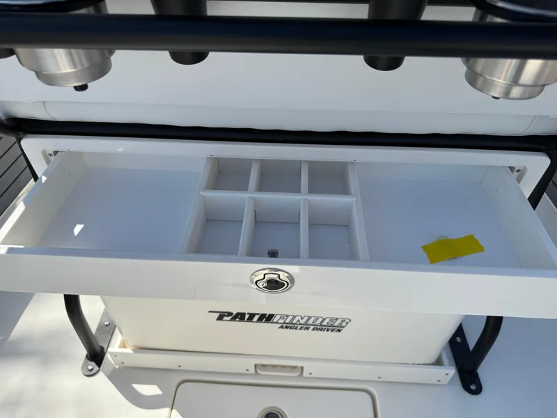 Slide: The Image of Pathfinder 2300 HPS 2025 model with open tackle storage compartment. - 45