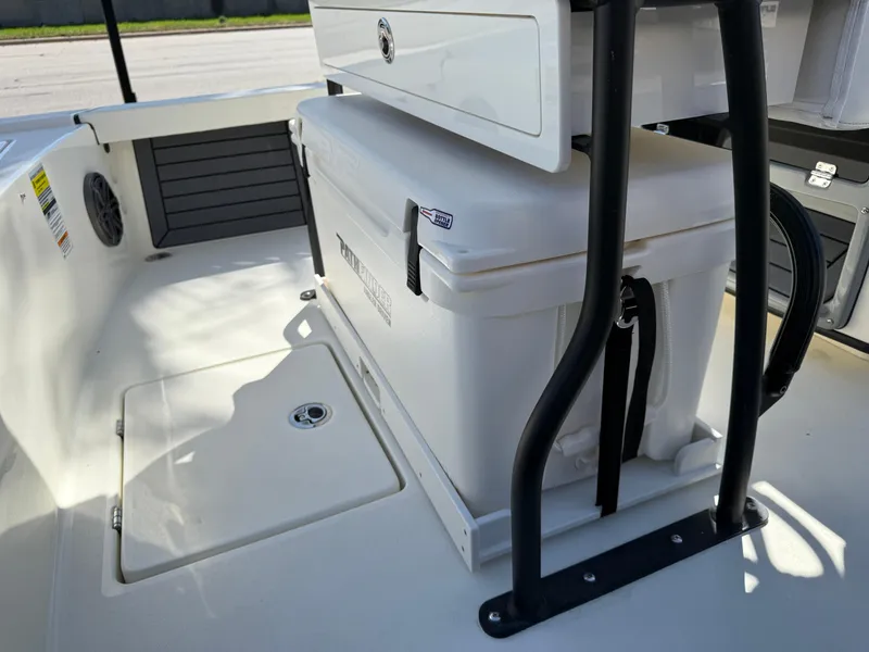 Slide: The Image of 2025 Pathfinder 2300 HPS boat interior with cooler and storage compartment. - 47