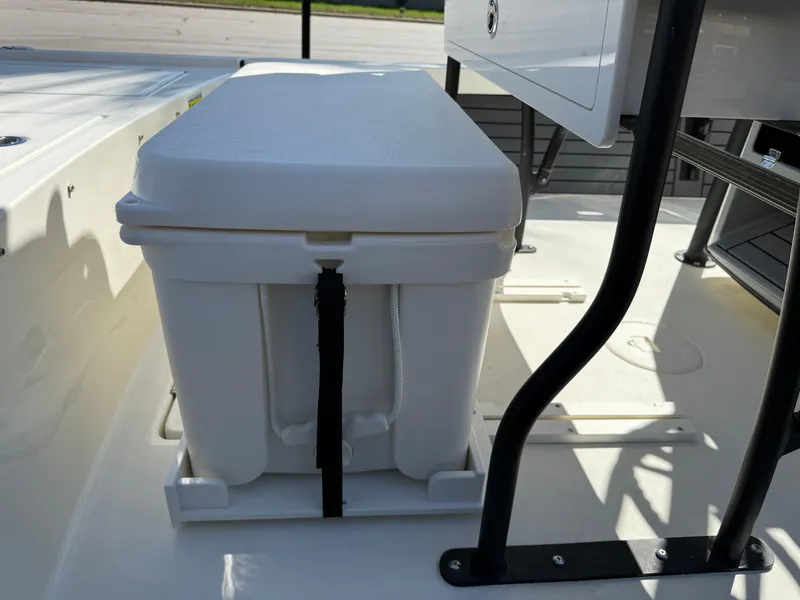 Slide: The Image of White cooler secured on a 2025 Pathfinder 2300 HPS boat deck. - 48