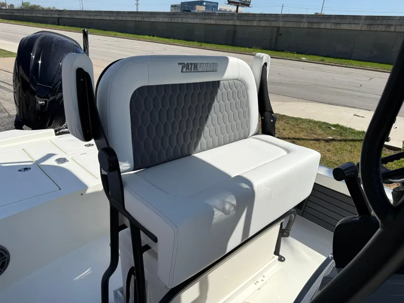 Slide: The Image of 2025 Pathfinder 2300 HPS boat seat with gray upholstery and black frame. - 49