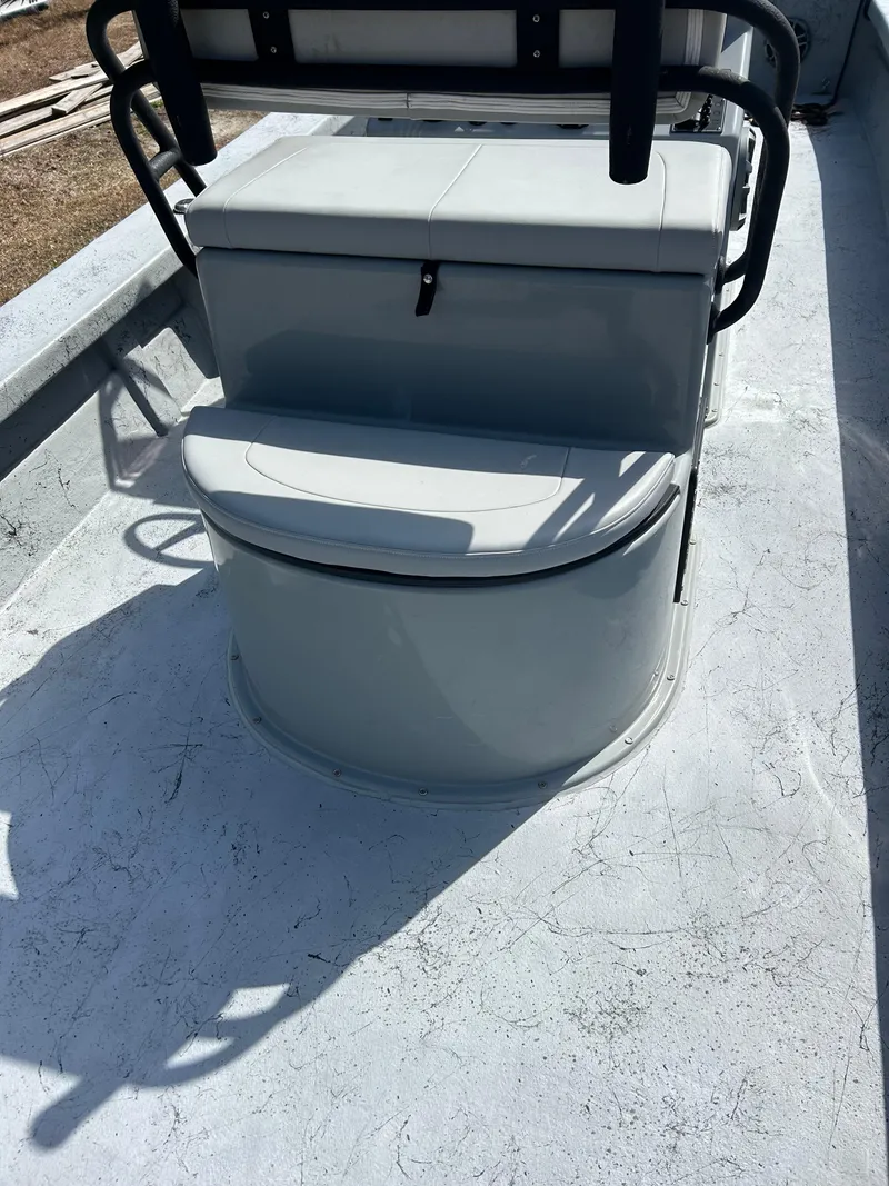 Slide: The Image of 2022 May-Craft 25 Hancock Edition boat seating and storage area. - 7