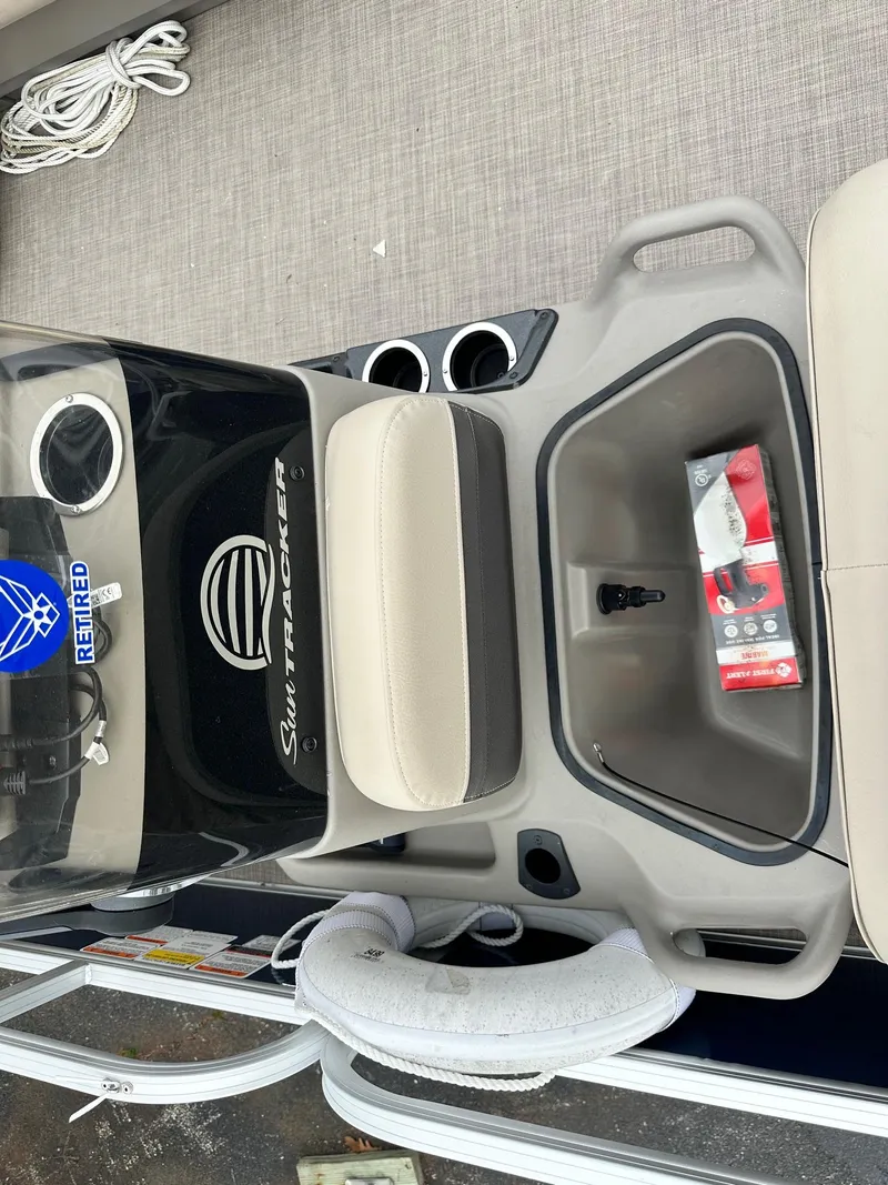 Slide: The Image of 2023 Sun Tracker Bass Buggy 16 XL Select boat console with seating and storage. - 18