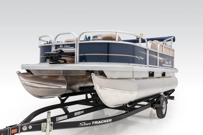 Slide: The Image of 2023 Sun Tracker Bass Buggy 16 XL Select pontoon boat on trailer. - 5