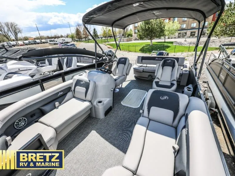 Slide: The Image of 2025 Aria Ultra-Lounge A22UC pontoon boat with spacious seating and canopy at Bretz RV & Marine. - 18