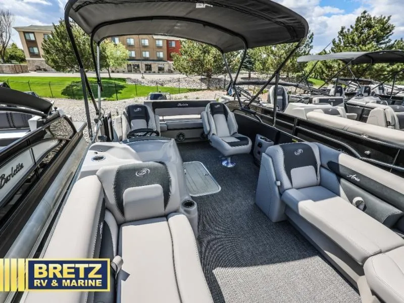 Slide: The Image of 2025 Aria Ultra-Lounge A22UC pontoon boat with spacious seating and canopy at Bretz RV & Marine. - 20