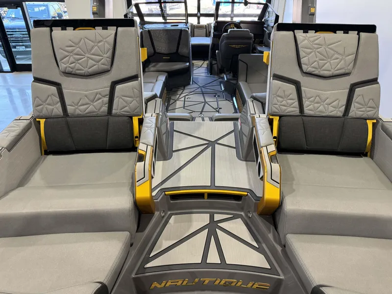 Slide: The Image of 2024 Nautique Super Air Nautique G25 Paragon interior with luxurious seating and modern design. - 10