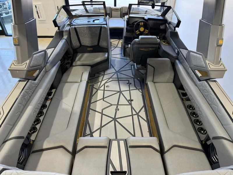 Slide: The Image of 2024 Nautique Super Air Nautique G25 Paragon interior with luxurious seating and modern design. - 13