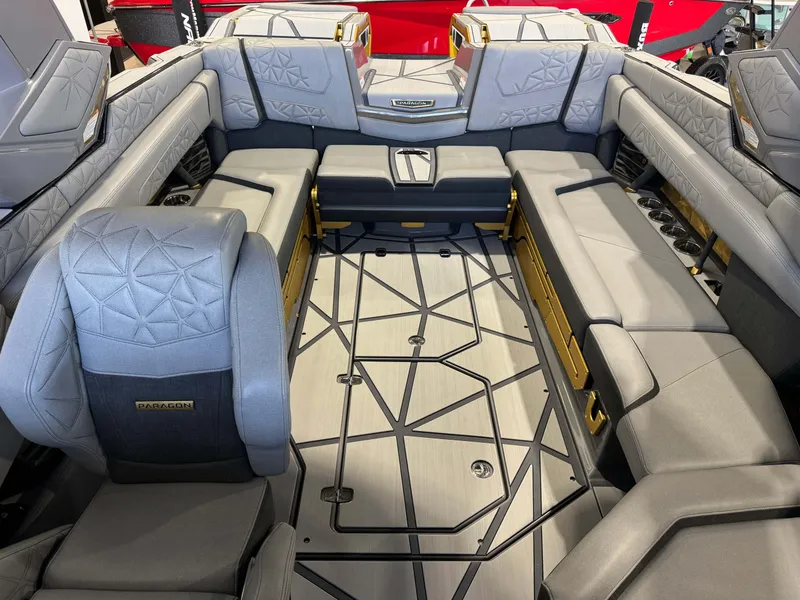 Slide: The Image of Luxurious interior of 2024 Nautique Super Air Nautique G25 Paragon boat with elegant seating. - 22