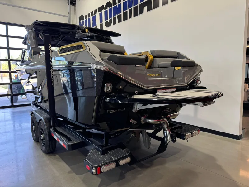 Slide: The Image of 2024 Nautique Super Air Nautique G25 Paragon boat on trailer in showroom. - 5