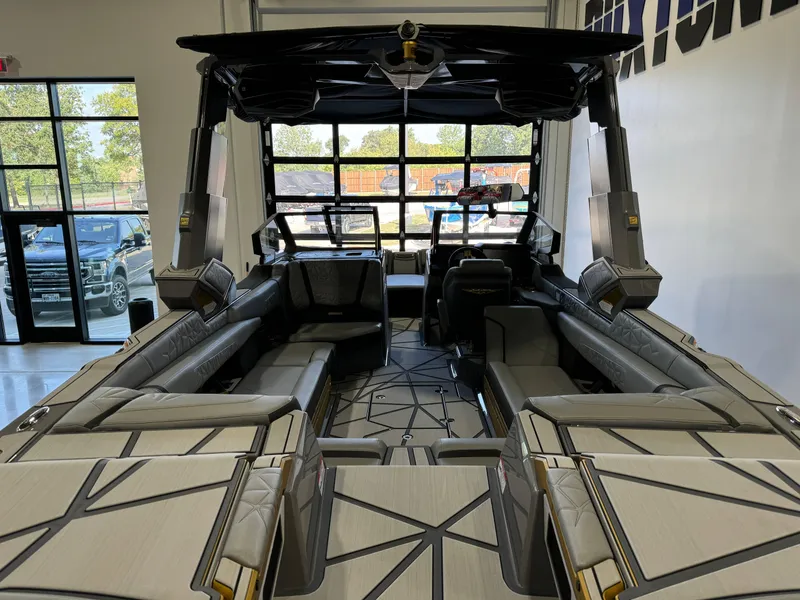 Slide: The Image of 2024 Nautique Super Air Nautique G25 Paragon interior with luxurious seating and modern design. - 6