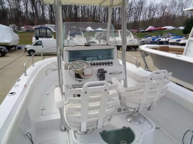 Slide: The Image of 2008 Triumph 215 CC boat interior with dual seats and control panel. - 7