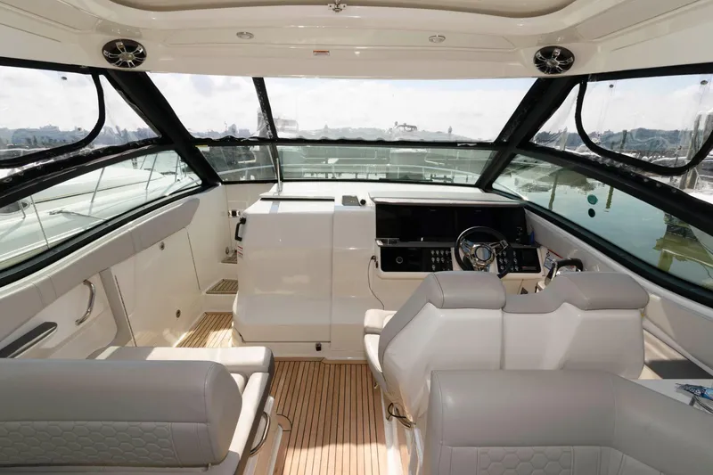 Slide: The Image of Interior of 2020 Sea Ray Sundancer 320 yacht with modern helm and seating. - 5