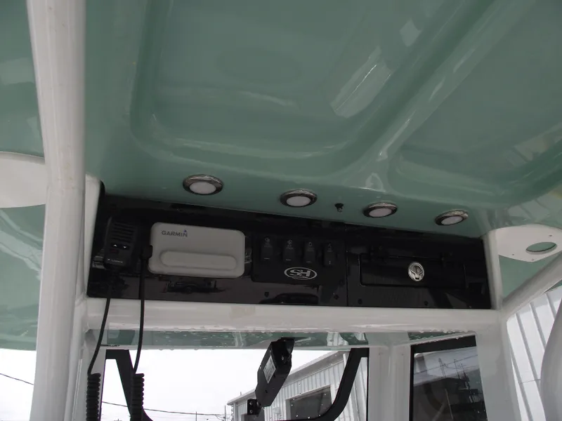 Slide: The Image of 2024 Sea Hunt Ultra 239 SE boat console with electronics and lighting. - 20