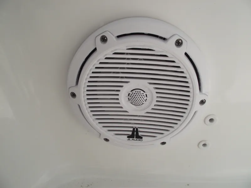 Slide: The Image of 2024 Sea Hunt Ultra 239 SE boat speaker, JL Audio, white grille design. - 28