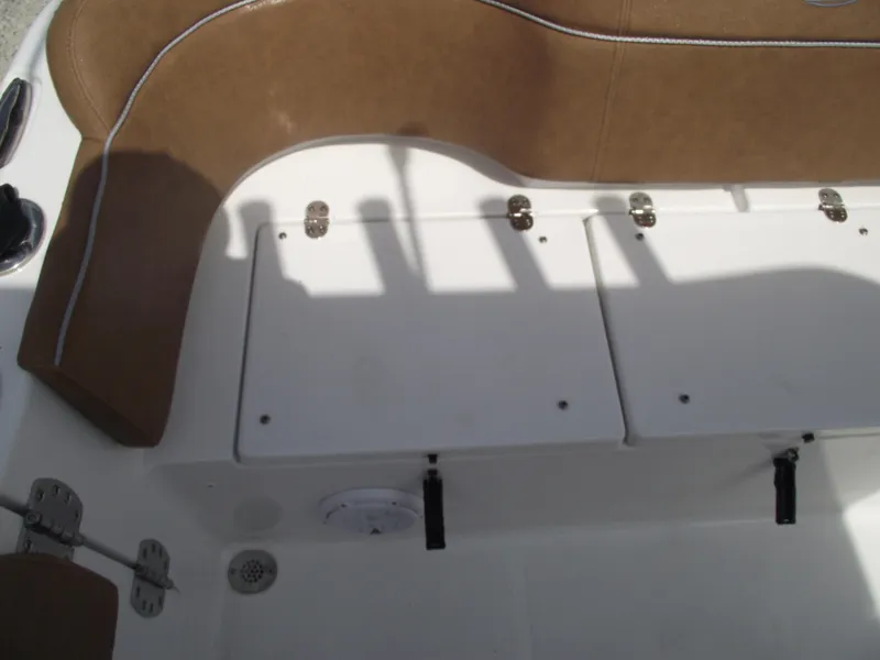 Slide: The Image of 2024 Sea Hunt Ultra 239 SE boat seating and storage compartments. - 41