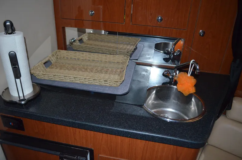 Slide: The Image of 2008 Regal 3360 Window Express boat interior with sink and countertop. - 13
