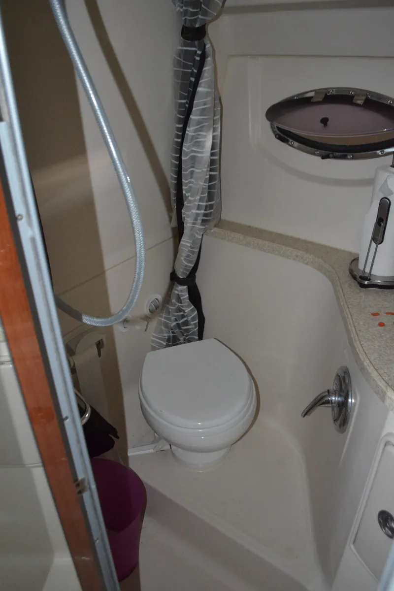 Slide: The Image of 2008 Regal 3360 Window Express bathroom with shower and toilet. - 18