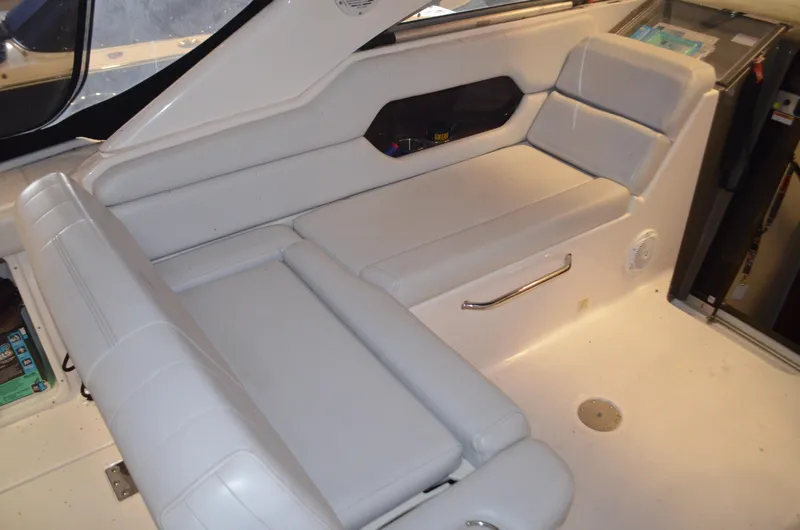 Slide: The Image of 2008 Regal 3360 Window Express interior with white leather seating and modern design. - 6