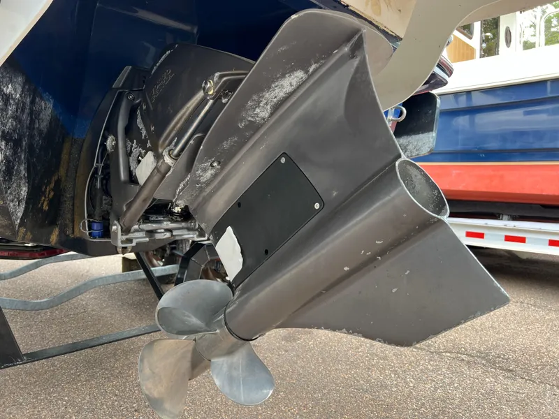 Slide: The Image of 2019 Chaparral 23 H2O Surf boat propeller and stern drive detail. - 19