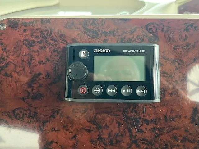 Slide: The Image of Fusion MS-NRX300 stereo system on 1996 Sea Ray 330 Sundancer boat dashboard. - 16