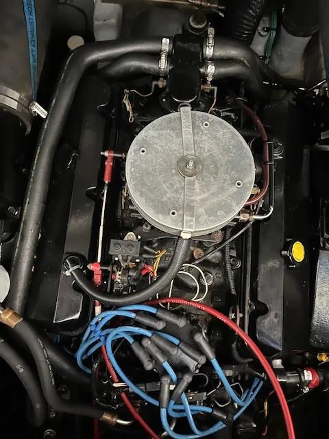 Slide: The Image of Engine of a 1996 Sea Ray 330 Sundancer boat with visible wiring and components. - 33