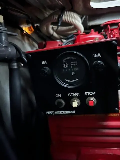 Slide: The Image of Control panel of a Westerbeke engine in a 1996 Sea Ray 330 Sundancer boat. - 35