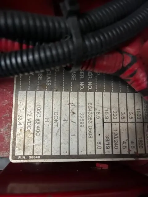 Slide: The Image of Close-up of a 1996 Sea Ray 330 Sundancer engine label with specifications. - 36