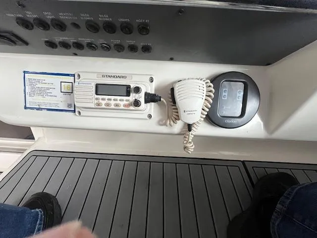 Slide: The Image of Control panel of a 1996 Sea Ray 330 Sundancer boat with radio and speaker. - 41