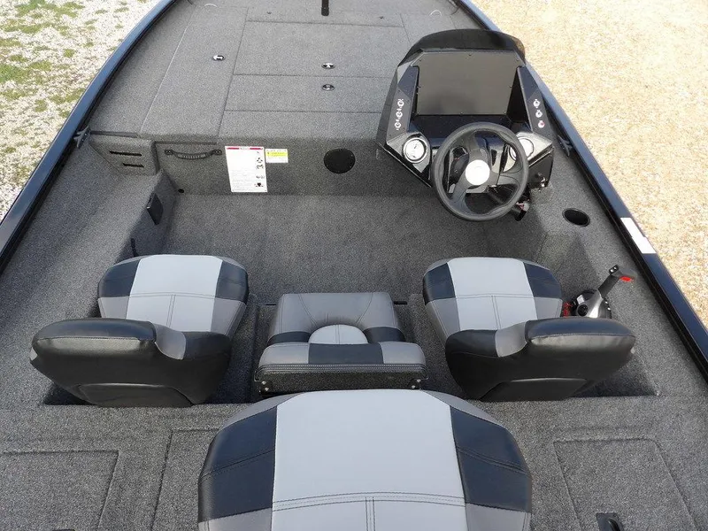 Slide: The Image of 2025 Crestliner XFC 189 boat interior with steering console and seating. - 17